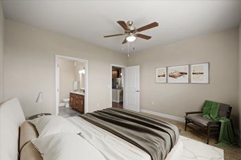 Bedroom with large bed and a ceiling fan